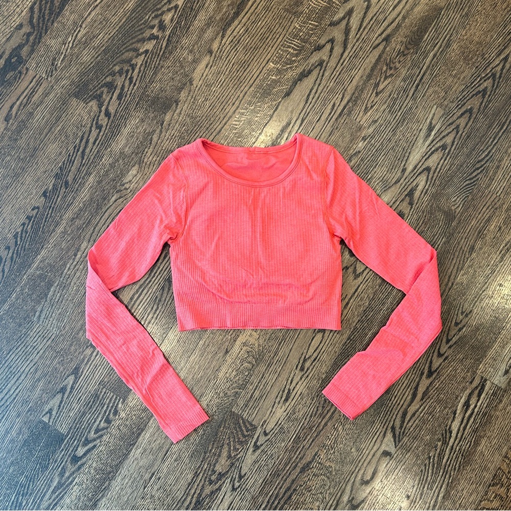 Lululemon ebb to street long sleeve cropped top size 4 coral